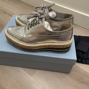 Stunning Prada silver platform brogues